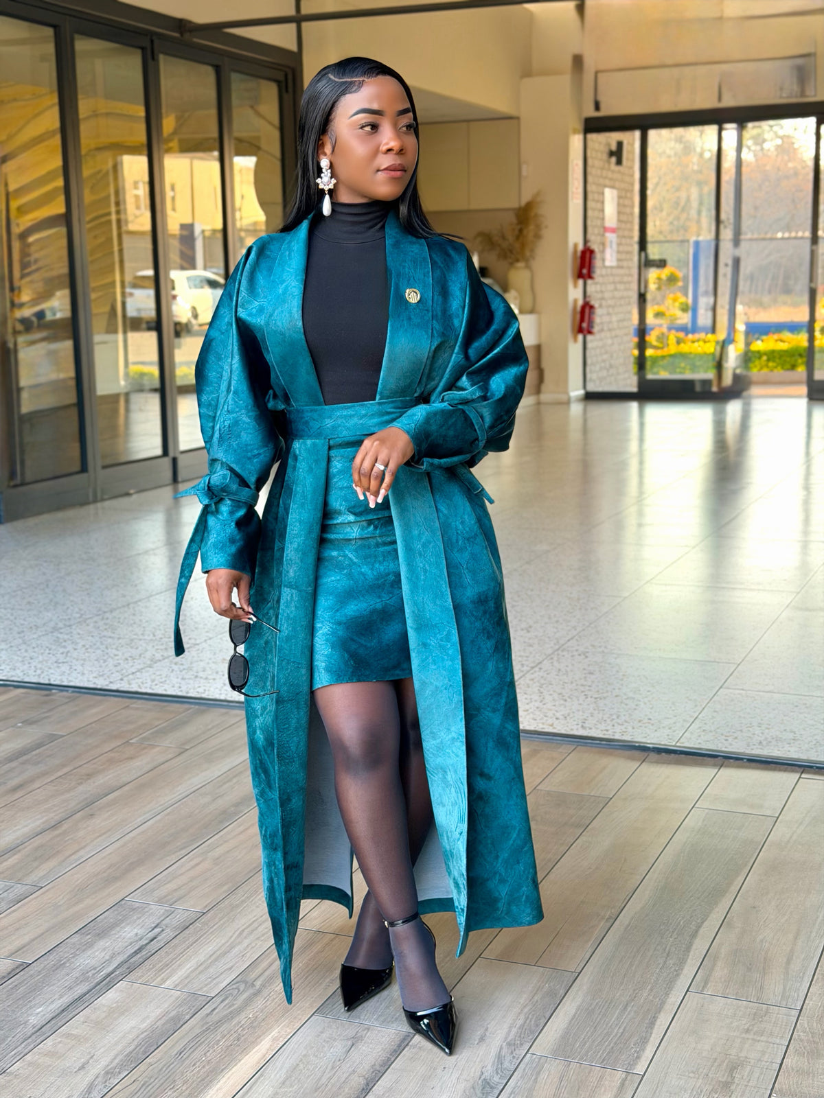 Teal textured long belted coat and matching mini skirt, full length